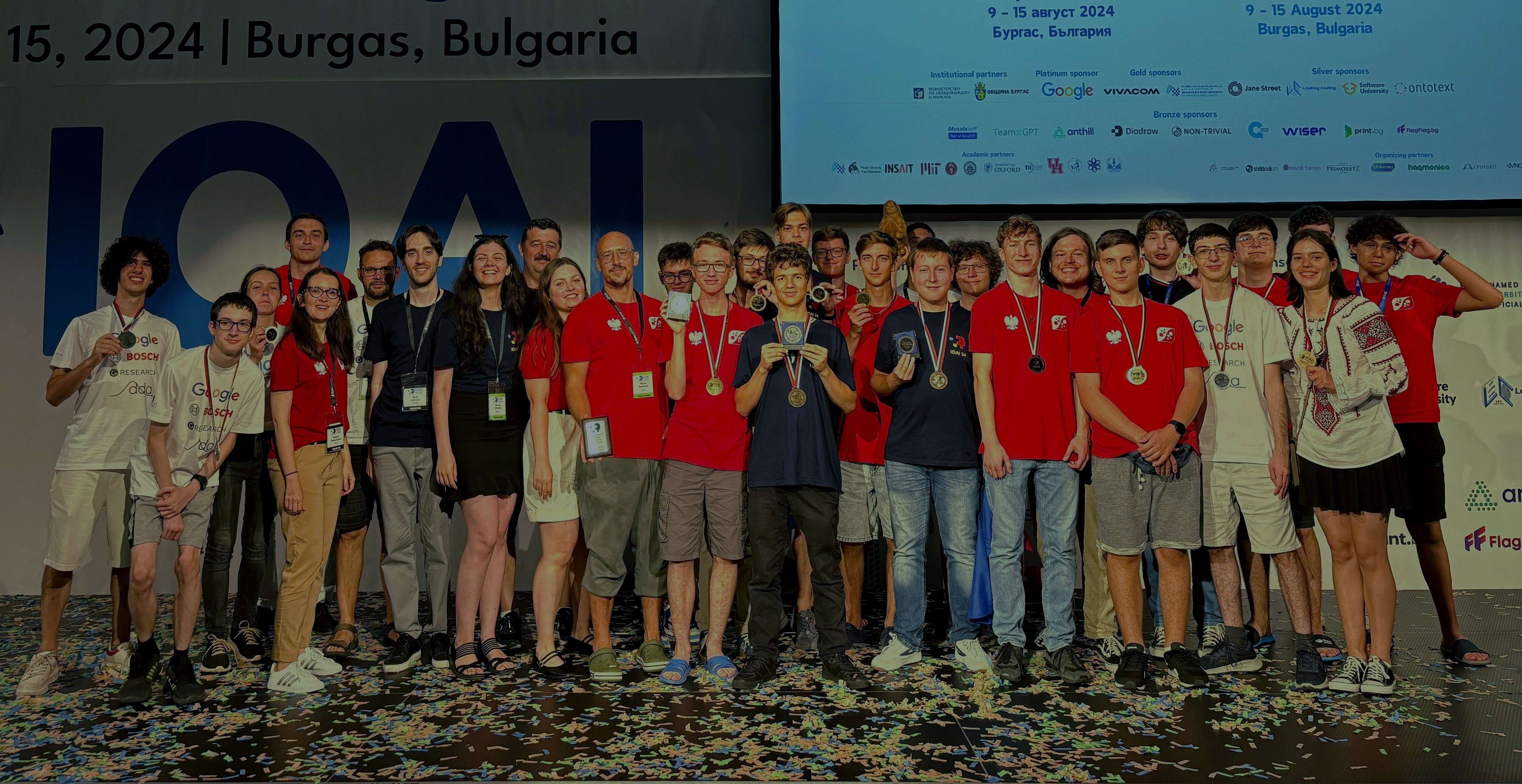 Nitro students celebrating with medals at an AI olympiad awards ceremony